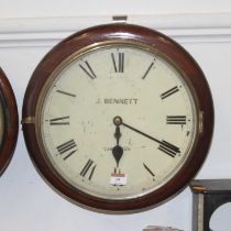 A Victorian mahogany wall clock having a 12" enamel dial with Roman numerals signed J Bennett,