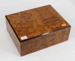 An Italian burr walnut veneered humidor, w.30cm, together with two pairs of cigar cutters,