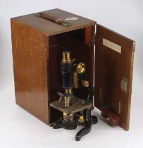 A 20th century lacquered brass and iron "Service" monocular student's microscope by W Watts & Son