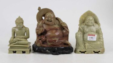 A carved hardstone figure of a seated buddha, height 16cm, together with another of a seated deity