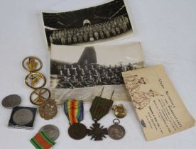 A collection of military ephemera to include a 1914/17 war cross, a victory medal, and a 1934 public