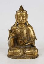 A gilt metal figure of Guan Yin,height 19cm No splits, cracks or damage.