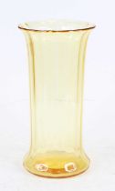 A Stuart yellow glass sleeve vase having a flared rim and faceted cylindrical body and flared