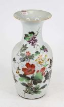 A Chinese porcelain vase of slight baluster shape having a recessed neck, and flared rim, the body