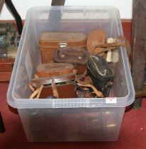 A collection of 19th century and later binoculars, some cased, some loose, mostly for spares or