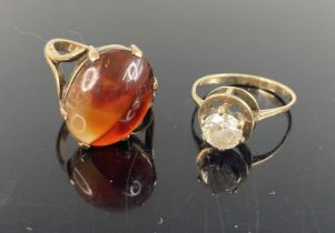 A yellow metal and CZ set dress ring, unmarked but tests as approx 14ct, 1.9g,m size J, together