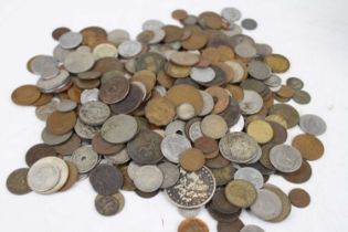 A selection of British and world coins, with silver examples, to include an 1885 USA silver Morgan