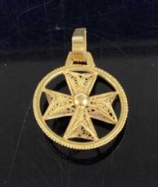 An 18ct gold and filigree worked openwork pendant, 2.5g, dia. 21mm