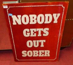 A printed tin wall sign titled Nobody Gets Out Sober, 70 x 50cm