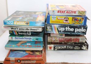 A large collection of vintage children's board games, with examples including Escape From Colditz,