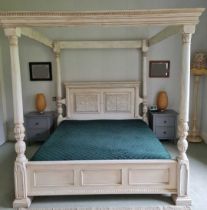 A contemporary white painted hardwood super kingsize full tester bed (currently dismantled) 180cm