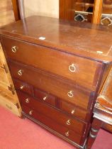 Stag Minstrel bedroom furniture to include; a chest of three short and four long drawers, width 81.