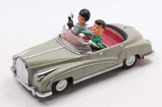 A Chinese tinplate battery operated 1950's cabriolet based on a Rolls Royce, in grey, with