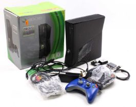 An XBOX 360 computer games console in its original box