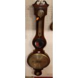 A 19th century mahogany four dial wheel barometer