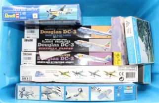 A collection of mixed scale model kits including a Revell 1/48th scale Supermarine Seafire, a