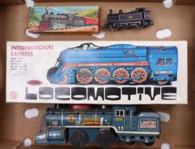 A Daiya of Japan large scale tinplate and clockwork friction drive locomotive, together with a boxed
