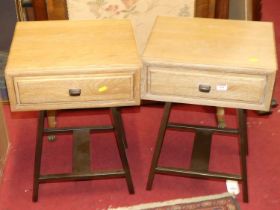 A pair of contemporary limed oak and anodised metal single drawer lamp tables, width 42cm