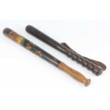 A Victorian turned wooden truncheon, polychrome painted with a crown over GWR for Great Western
