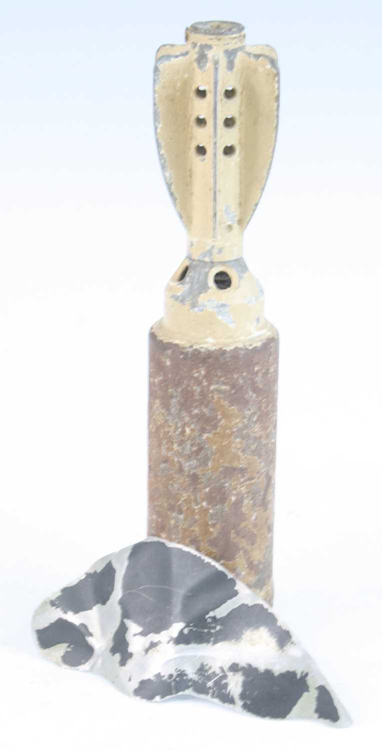 A WW II British 2" HE mortar shell, 24cm, together with an aluminium fragment, hand written June