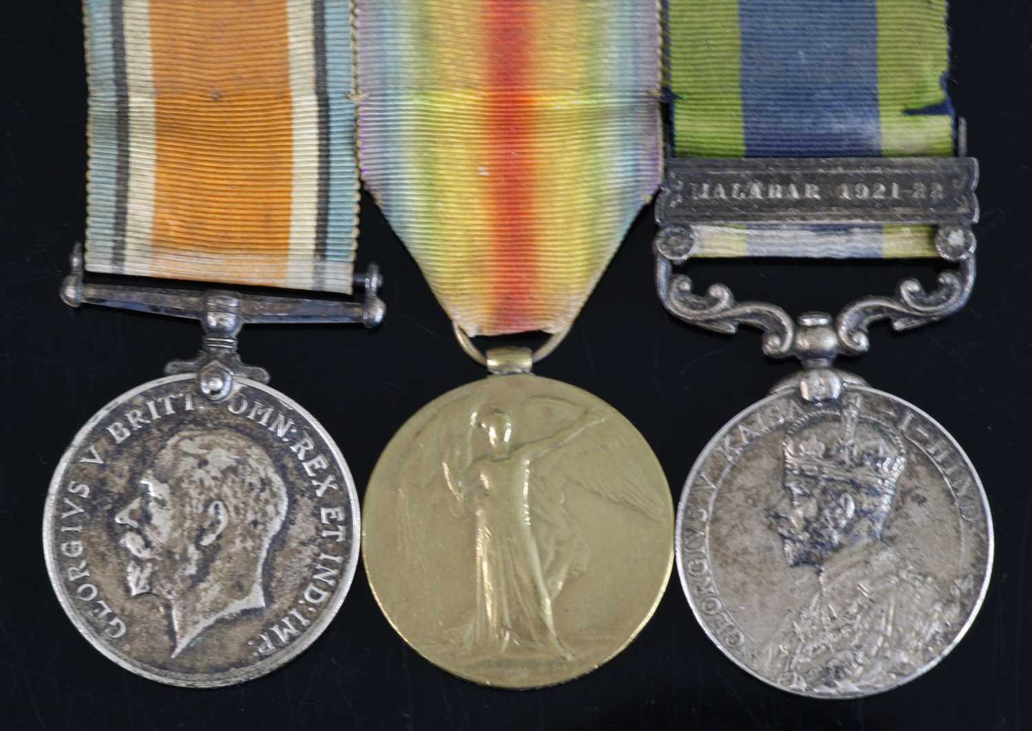 A group of three medals to include WW I British War and Victory, naming 7873 PTE. S.F. MARKELL.