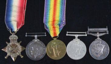 A family group of medals to include WW I 1914-15 Star, British War and Victory naming 225203 W.C.