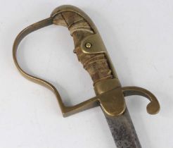 A 19th century German Officer's sword, having an unmarked 82cm pipe backed blade with brass