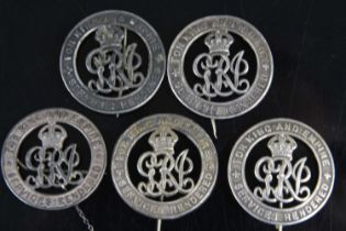 A collection of five WW I Silver War badges, each numbered verso with correspoding research to