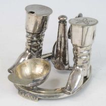 A late Victorian silver plated novelty cruet, the base in the form of a horseshoe with spur handle