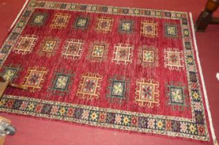 A Persian woollen red ground Bokhara rug, 197 x 144cm