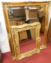 A 19th century floral gilt wood and gesso framed rectangular wall mirror (numerous losses to frame),