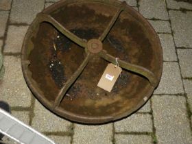 A cast iron circular four division livestock feeding trough, dia. 56cm Damaged to rim.Missing