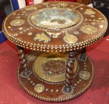 An Eastern hardwood brass mounted and further studded cylindrical two-tier wash stand, each tier