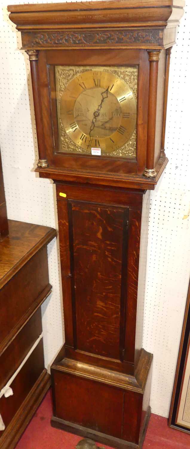A circa 1800 provincial oak and mahogany cross banded long case clock, having a brass dial, signed