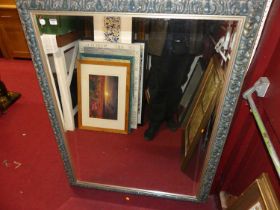 A reproduction gilt composition framed and bevelled rectangular wall mirror, 140 x 107cm