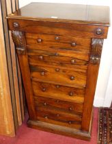 A mid-Victorian rosewood Wellington chest, having bank of six graduated drawers with acanthus leaf