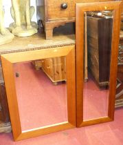 Two matching contemporary cherrywood framed bevelled rectangular wall mirrors