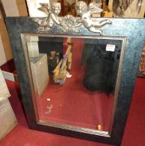 A reproduction silvered framed and bevelled rectangular wall mirror, 64 x 54cm