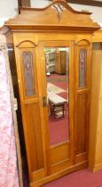 An Edwardian satin walnut single mirror door wardrobe, width 106.5cm With some scuffs and grazes