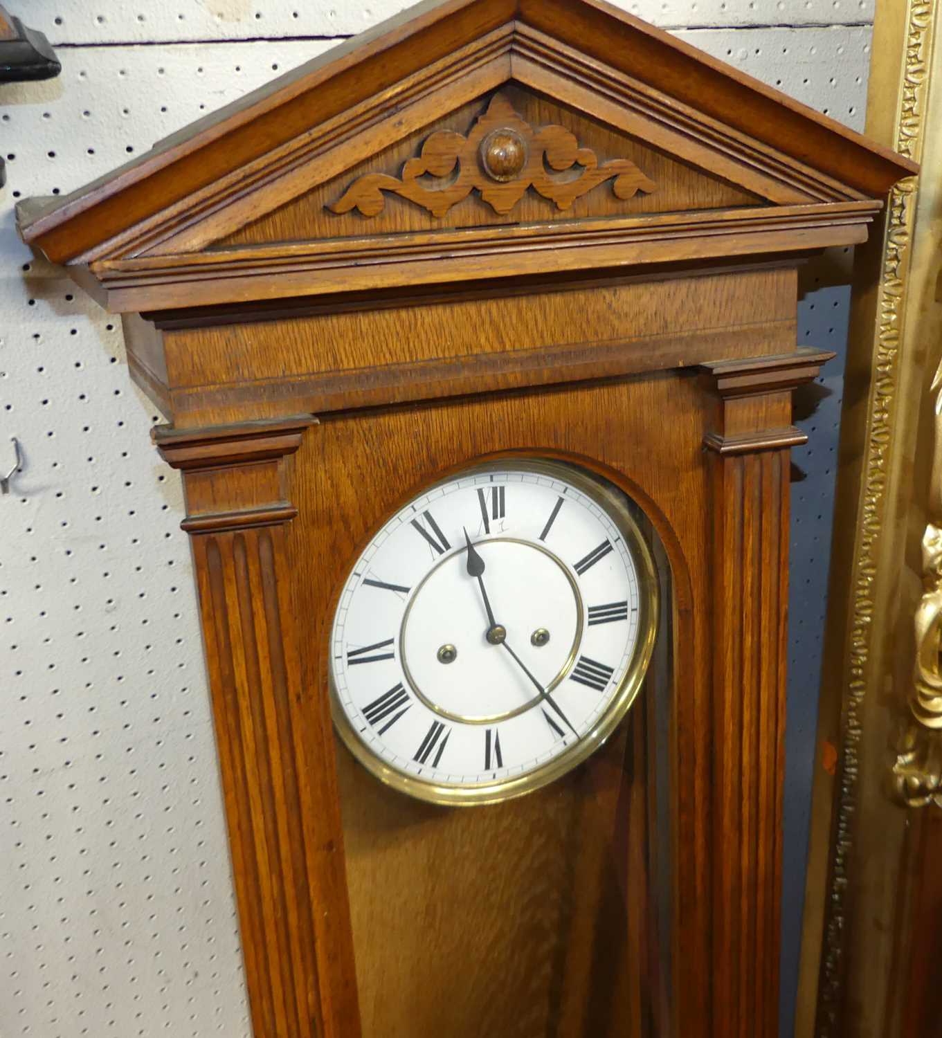 A late 19th century oak cased Vienna wall clock by Lenzkirk, having an unsigned white enamel Roman - Image 2 of 3