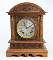 A Winterhalder & Hofmeier oak cased bracket clock, circa 1900, the case with metal mounts, the 30-