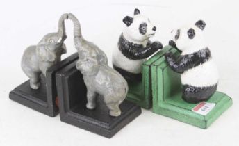 A pair of novelty painted cast iron bookends, each in the form of an elephant shown with its trunk