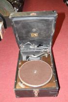 An HMV rexine bound table top gramophone, width 29cm