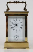 A French lacquered brass cased carriage clock, having visible platform escapement, white enamel dial