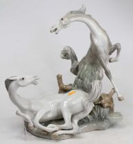 A large Lladro porcelain horse group, height 40cm Condition is good.