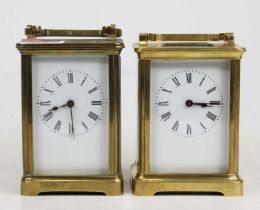 An early 20th century lacquered brass carriage clock, probably French, having an unsigned white