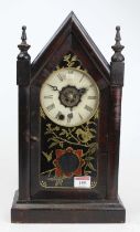 A late 19th century American Ansonia ebonised rosewood cased mantel clock, having a white enamel