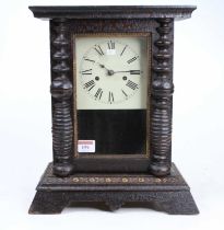 A mid 19th century Black Forest mantel clock with black lacquered case with square white enamel