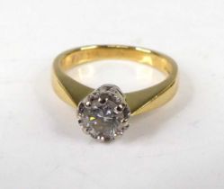 An 18ct gold diamond solitaire ring, the claw set round brilliant weighing approx 0.45 carats,