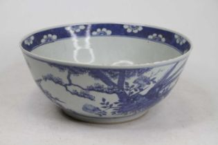 A Chinese blue & white porcelain bowl decorated with birds amongst flowers, dia. 30.5cm (a/f)